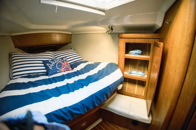 Slide: The Image of Interior of a 1994 Hunter Passage yacht with cozy bed. - 6