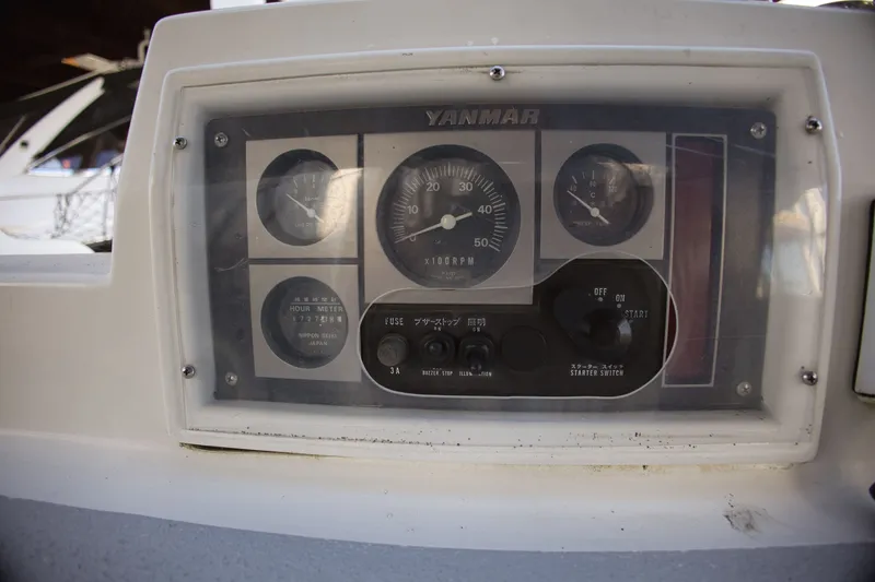 Slide: The Image of Yanmar engine control panel on a 1994 Hunter Passage boat. - 11