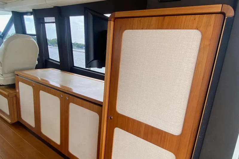 Slide: The Image of Interior of 2014 Azimut Magellano 50 yacht with wood and fabric paneling. - 13