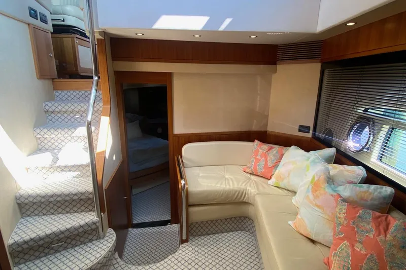 Slide: The Image of Luxurious interior of 2014 Azimut Magellano 50 yacht with plush seating and elegant decor. - 23
