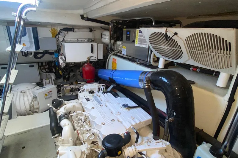 Slide: The Image of Engine room of 2014 Azimut Magellano 50 yacht, showcasing mechanical components and systems. - 39
