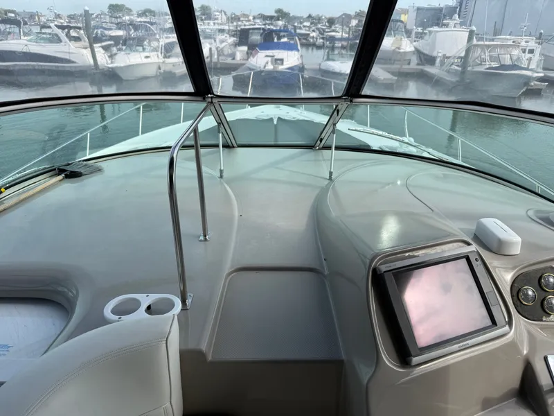 Slide: The Image of Interior view of 2003 Cruisers Yachts 3772 Express in marina. - 11