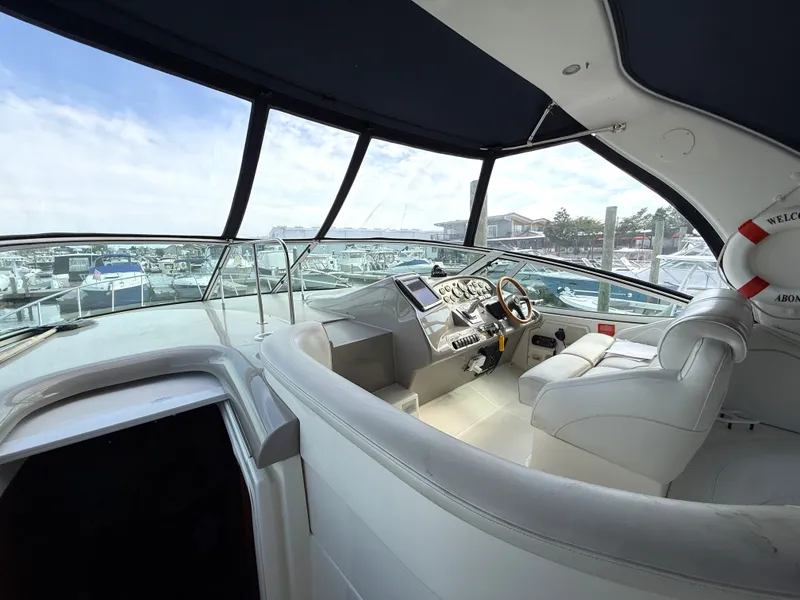Slide: The Image of Interior of 2003 Cruisers Yachts 3772 Express at marina. - 12