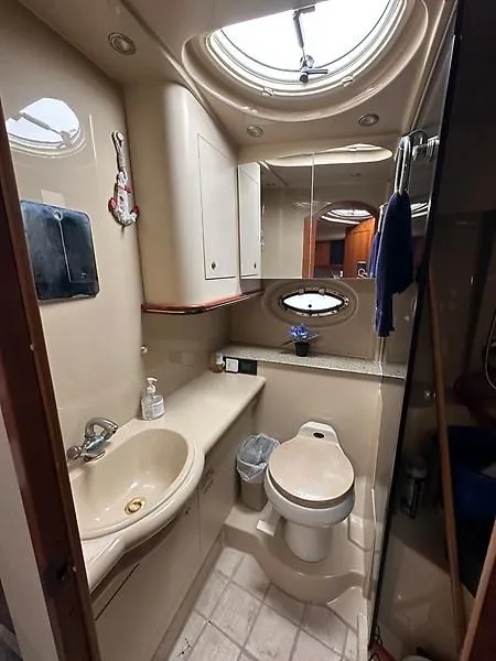 Slide: The Image of 2003 Cruisers Yachts 3772 Express bathroom with sink and toilet. - 20
