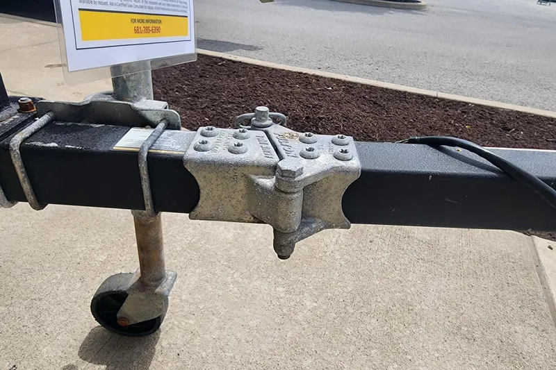 Slide: The Image of Trailer hitch of a 2022 GRIZZLEY 1654SPT on concrete pavement. - 3
