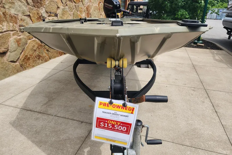 Slide: The Image of Pre-owned 2022 GRIZZLEY 1654SPT boat for sale at $15,500, displayed outdoors. - 9