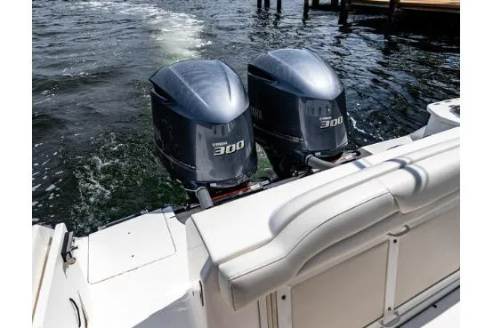 Slide: The Image of 2021 Everglades 295 Center Console helm with advanced navigation displays and controls. - 7