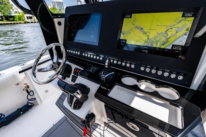Slide: The Image of Interior of 2021 Everglades 295 Center Console boat with toilet and storage. - 9