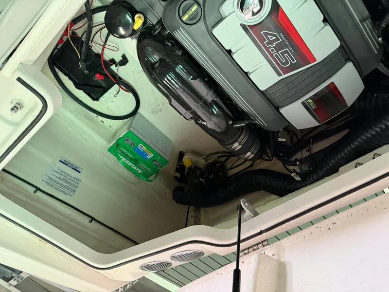 Slide: The Image of Engine compartment of 2023 Bayliner VR4 BOWRIDER with MerCruiser 4.5L engine. - 12