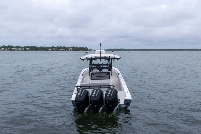 Slide: The Image of 2024 Fountain Bluewater 34 Tournament Edition boat on calm waters. - 29