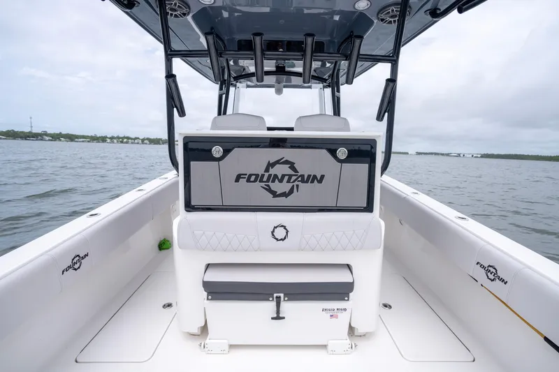 Slide: The Image of 2024 Fountain Bluewater 34 Tournament Edition boat interior on open water. - 36