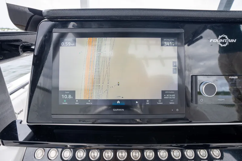 Slide: The Image of Garmin navigation display on 2024 Fountain Bluewater 34 Tournament Edition boat dashboard. - 42