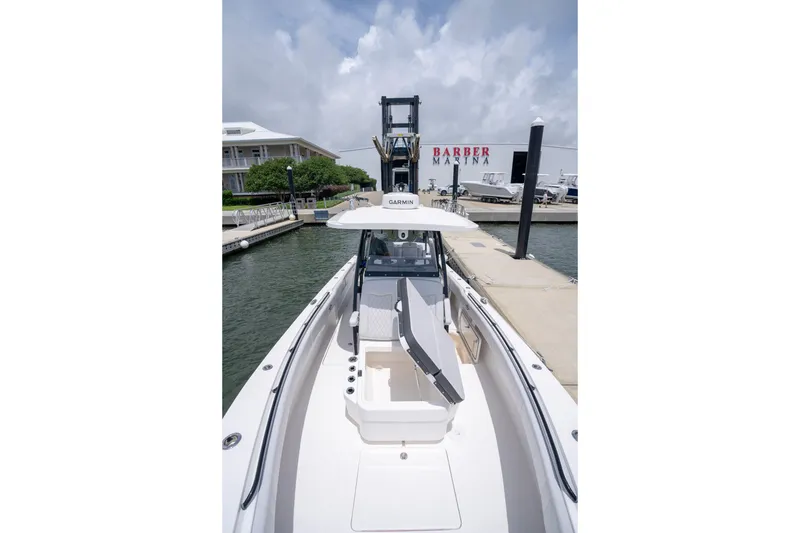 Slide: The Image of 2024 Fountain Bluewater 34 Tournament Edition boat docked at Barber Marina. - 59