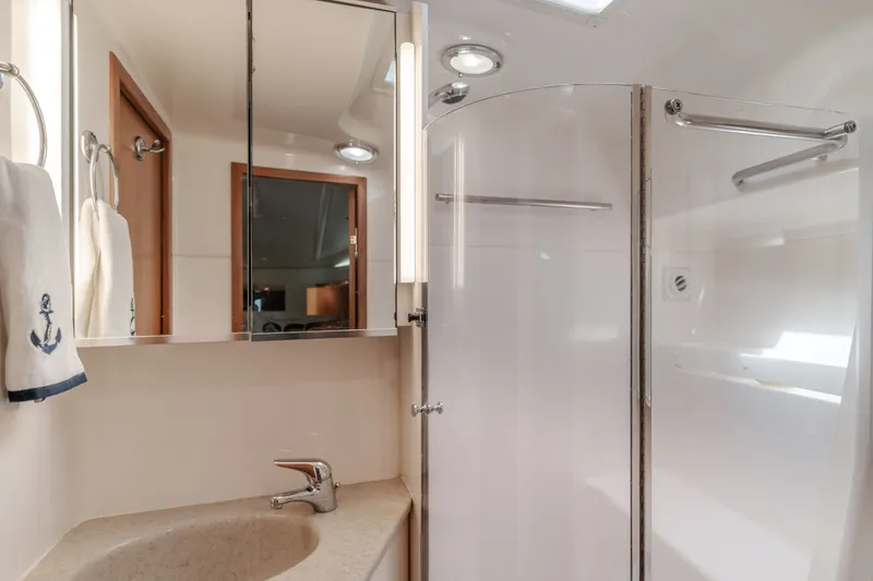 Slide: The Image of Tiara Yachts 4000 bathroom, 2004 model, featuring shower and mirror. - 46