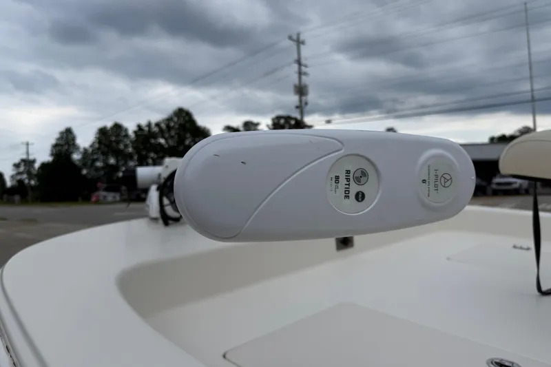 Slide: The Image of 2020 Carolina Skiff 21 LS boat with Minn Kota Riptide trolling motor, cloudy sky background. - 37