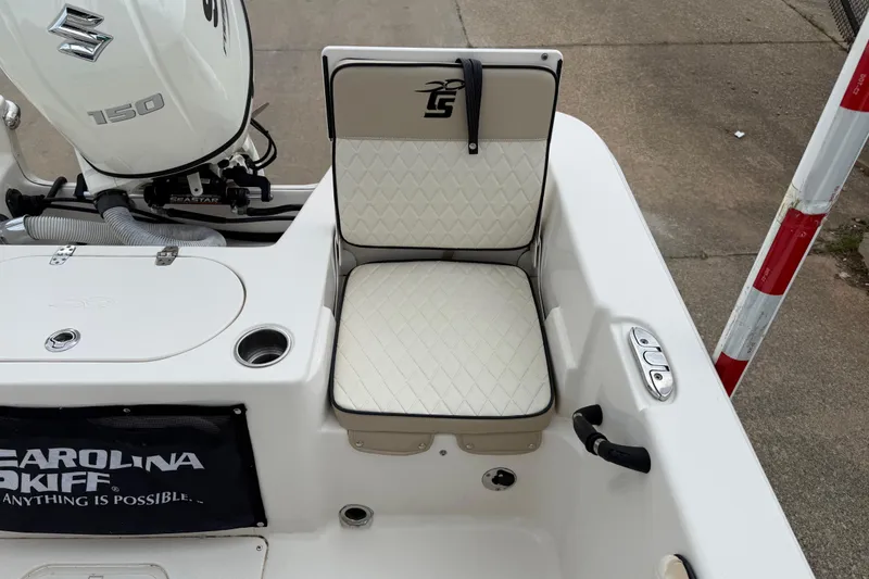 Slide: The Image of 2020 Carolina Skiff 21 LS boat seat and Suzuki 150 engine detail. - 39