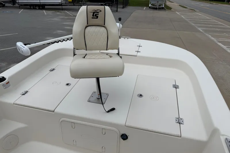 Slide: The Image of 2020 Carolina Skiff 21 LS boat with cushioned seat and storage compartments. - 56