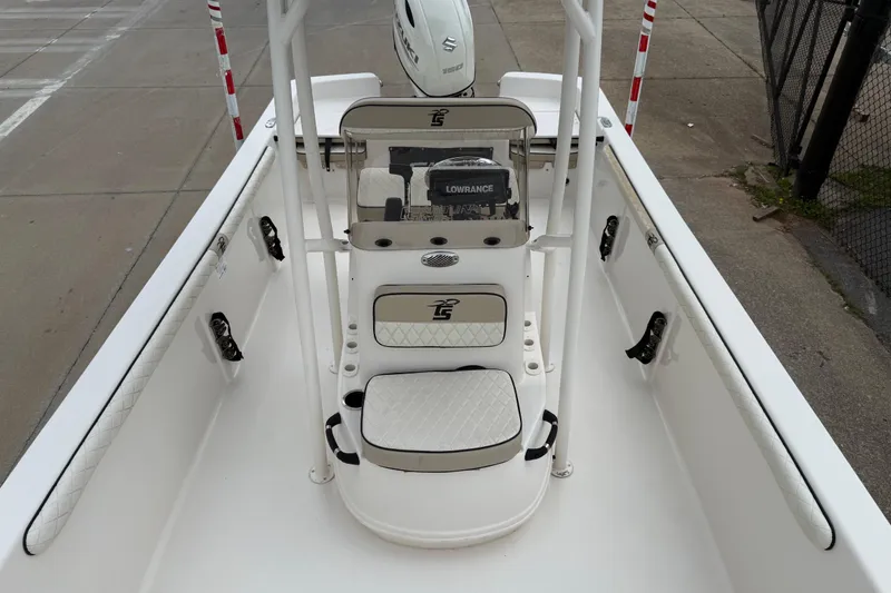 Slide: The Image of 2020 Carolina Skiff 21 LS boat interior with seating and navigation equipment. - 60