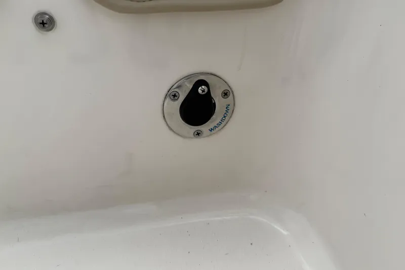 Slide: The Image of Washdown fitting on a 2020 Carolina Skiff 21 LS boat interior. - 62