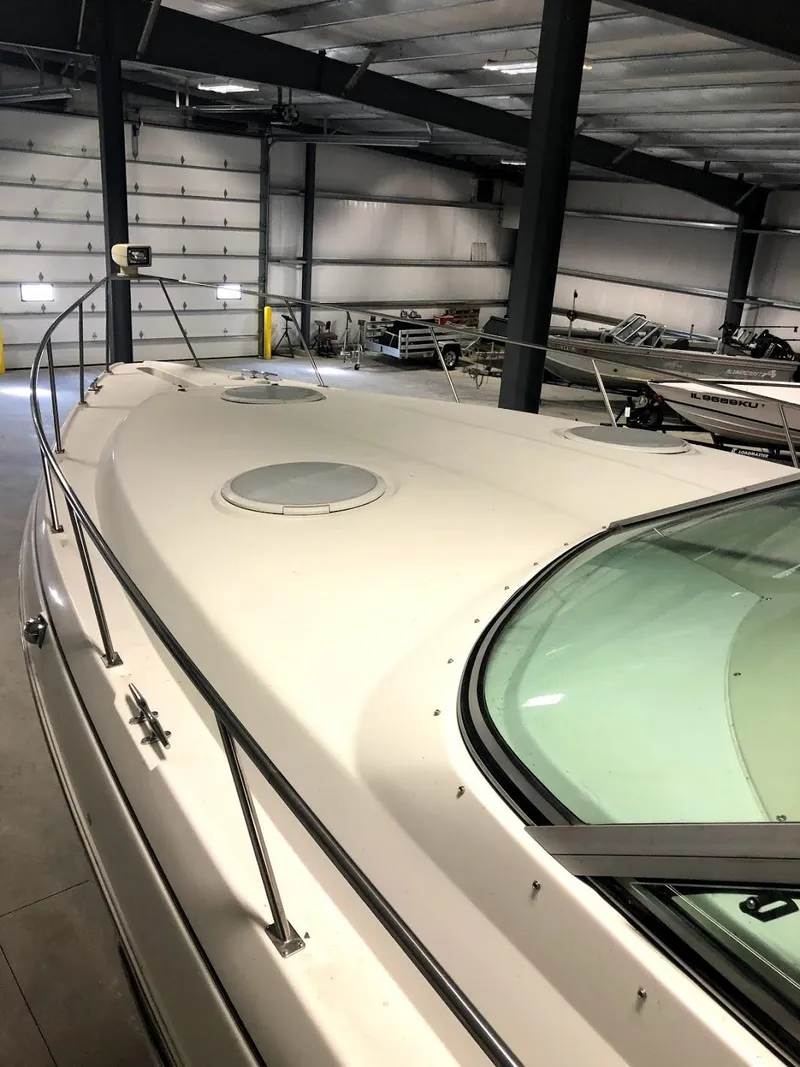 Slide: The Image of 2000 Cruisers Yachts 3575 Express in a storage facility. - 12