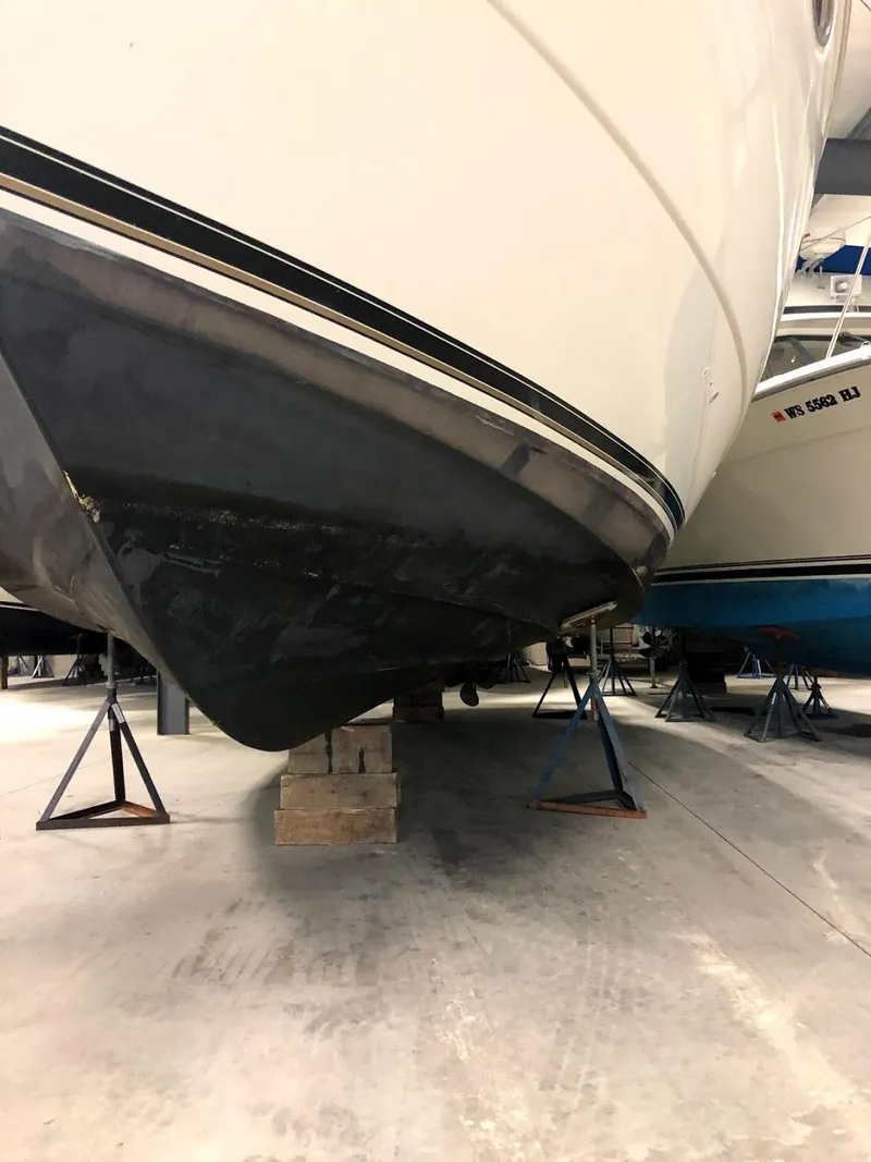 Slide: The Image of Cruisers Yachts 3575 Express 2000 dry-docked in a shipyard. - 14