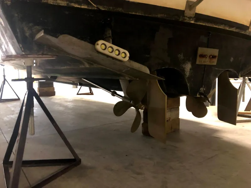 Slide: The Image of Underside of a 2000 Cruisers Yachts 3575 Express with propeller. - 16