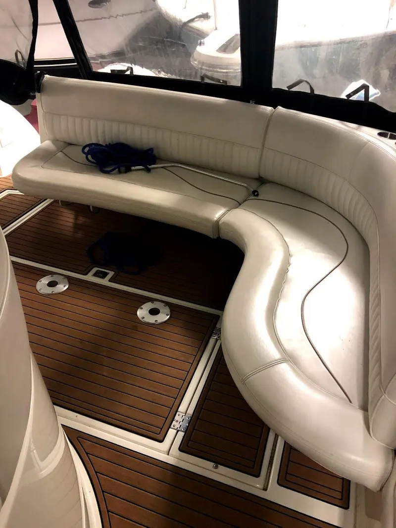 Slide: The Image of Interior of 2000 Cruisers Yachts 3575 Express with curved leather seating. - 21