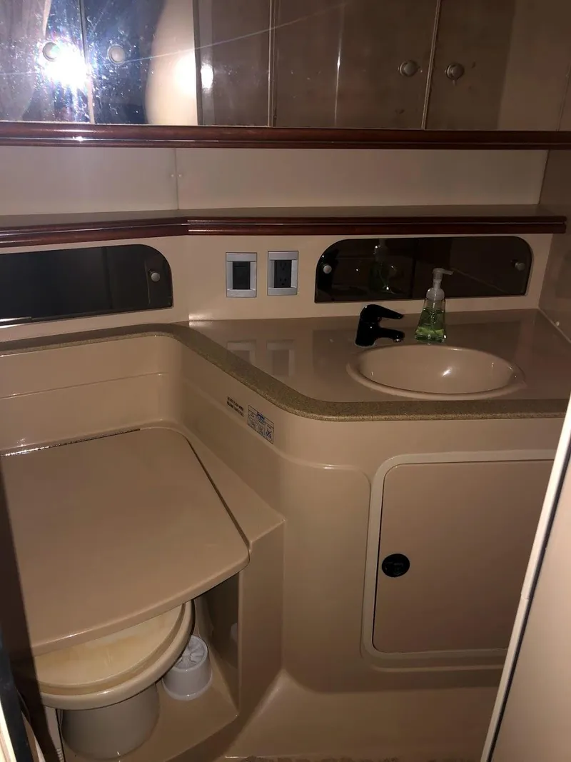 Slide: The Image of Bathroom of 2000 Cruisers Yachts 3575 Express with sink and storage. - 29