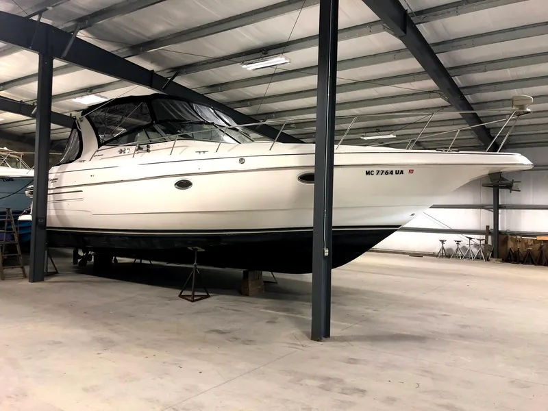 Slide: The Image of 2000 Cruisers Yachts 3575 Express in a storage facility. - 7