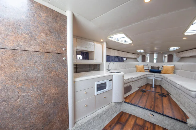 Slide: The Image of Luxurious interior of a 2003 Formula 400 Super Sport yacht with plush seating and modern amenities. - 18