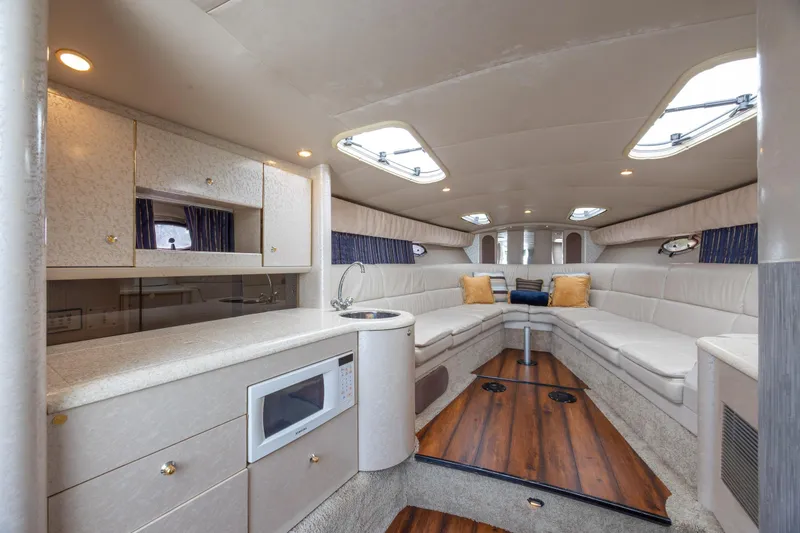 Slide: The Image of Luxurious interior of a 2003 Formula 400 Super Sport yacht with plush seating and modern amenities. - 19