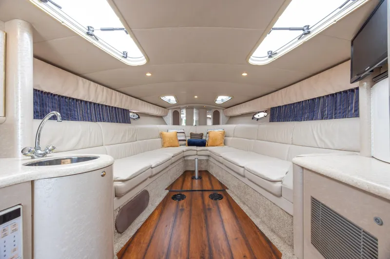 Slide: The Image of Luxurious interior of a 2003 Formula 400 Super Sport yacht with plush seating and modern amenities. - 21
