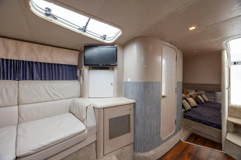 Slide: The Image of Interior of 2003 Formula 400 Super Sport yacht with cozy seating and modern amenities. - 22