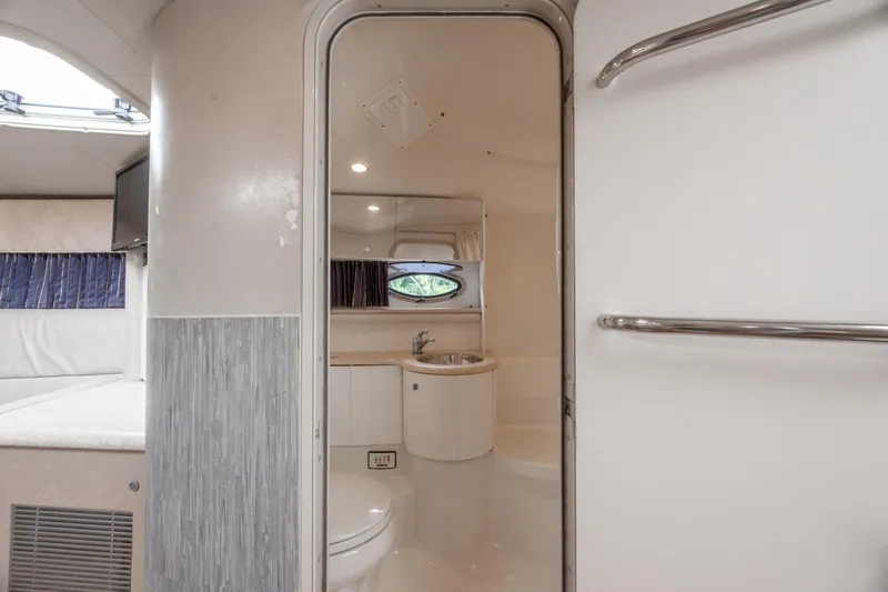 Slide: The Image of Interior of a 2003 Formula 400 Super Sport yacht bathroom with modern fixtures. - 23