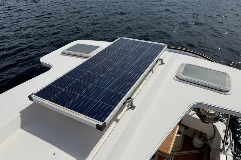 Slide: The Image of Solar panel on 2020 Ranger Tugs R-31 CB boat, floating on water. - 54