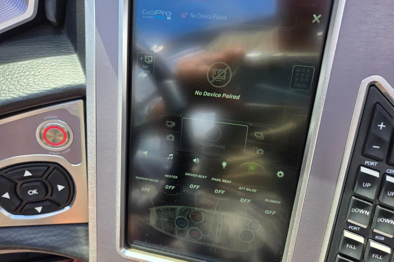 Slide: The Image of 2019 MasterCraft XT25 dashboard with touchscreen interface, showing "No Device Paired" message. - 62