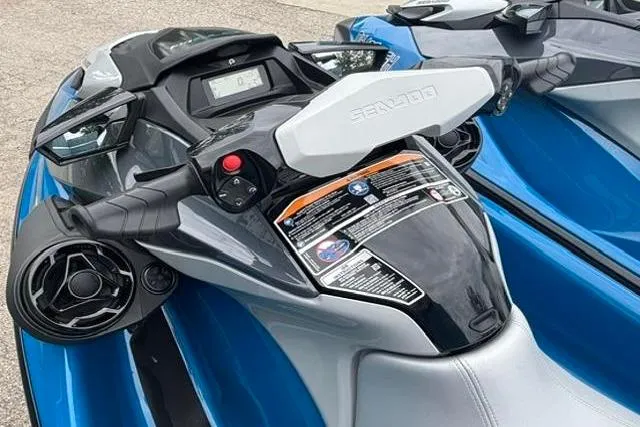 Slide: The Image of 2021 Seadoo GTI SE 130 jet ski, blue and gray, close-up of handlebars and dashboard. - 16