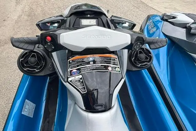 Slide: The Image of 2021 Seadoo GTI SE 130 jet ski dashboard with handlebars and controls. - 17