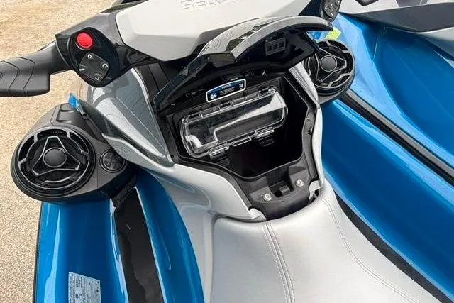 Slide: The Image of 2021 Seadoo GTI SE 130 jet ski with open storage compartment and sleek design. - 19