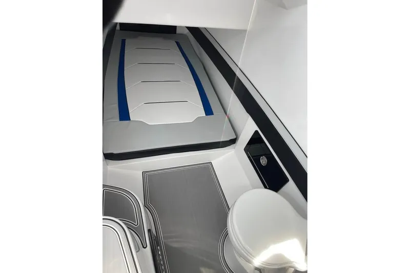 Slide: The Image of Interior cabin of 2026 Renegade 38 Open boat, featuring sleek design and modern amenities. - 14