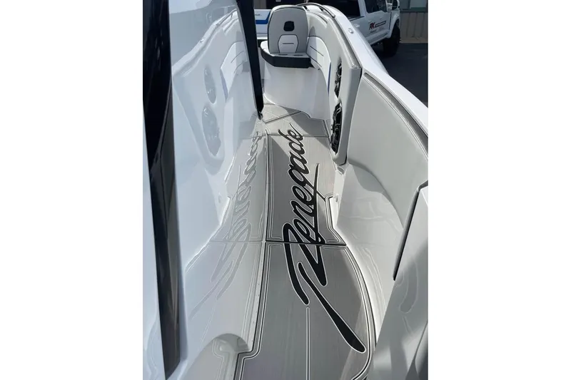 Slide: The Image of 2026 Renegade 38 Open boat interior with sleek design and logo detailing. - 15