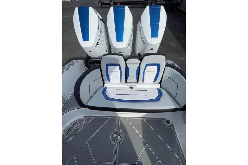 Slide: The Image of 2026 Renegade 38 Open boat with triple outboard engines and stylish seating. - 3