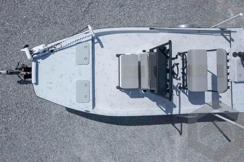 Slide: The Image of Overhead view of a 2017 Shoalwater 19' Catamaran on gravel surface. - 23