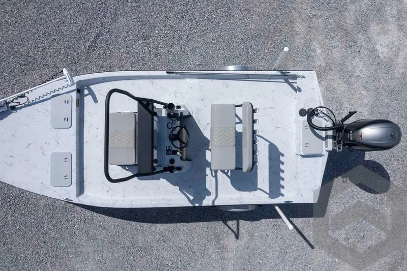 Slide: The Image of Overhead view of a 2017 Shoalwater 19' Catamaran on gravel. - 24
