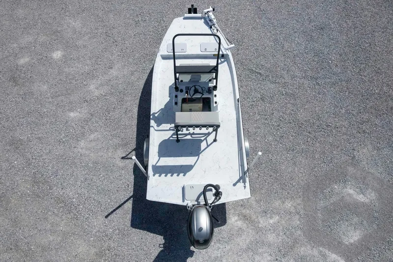 Slide: The Image of Overhead view of a 2017 Shoalwater 19' Catamaran on gravel surface. - 28