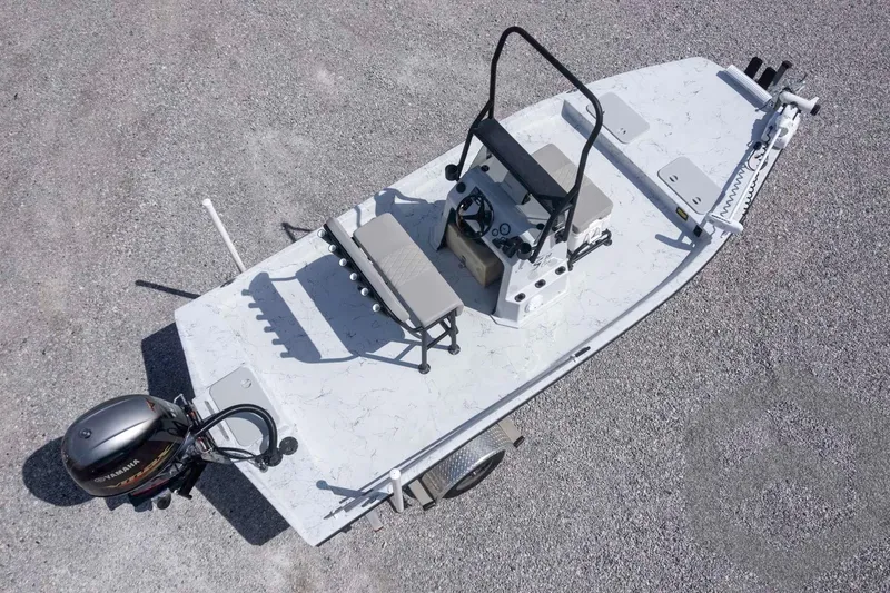 Slide: The Image of 2017 Shoalwater 19' Catamaran on gravel, featuring Yamaha outboard motor. - 29