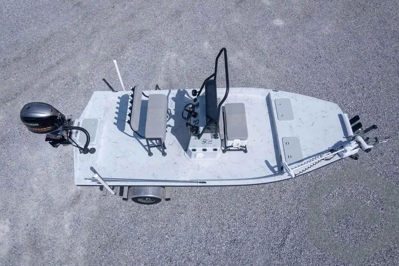 Slide: The Image of 2017 Shoalwater 19' Catamaran with Yamaha outboard, aerial view on gravel surface. - 30