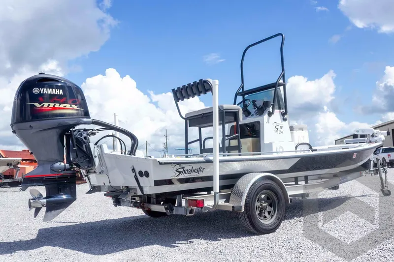Slide: The Image of 2017 Shoalwater 19' Catamaran with Yamaha VMAX engine on trailer under blue sky. - 6