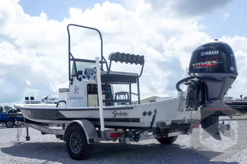 Slide: The Image of 2017 Shoalwater 19' Catamaran with Yamaha VMAX engine on trailer. - 8
