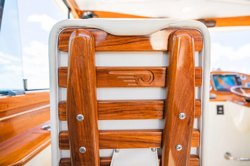 Slide: The Image of Polished wood detail on 2013 Hinckley Talaria 34 boat interior. - 21